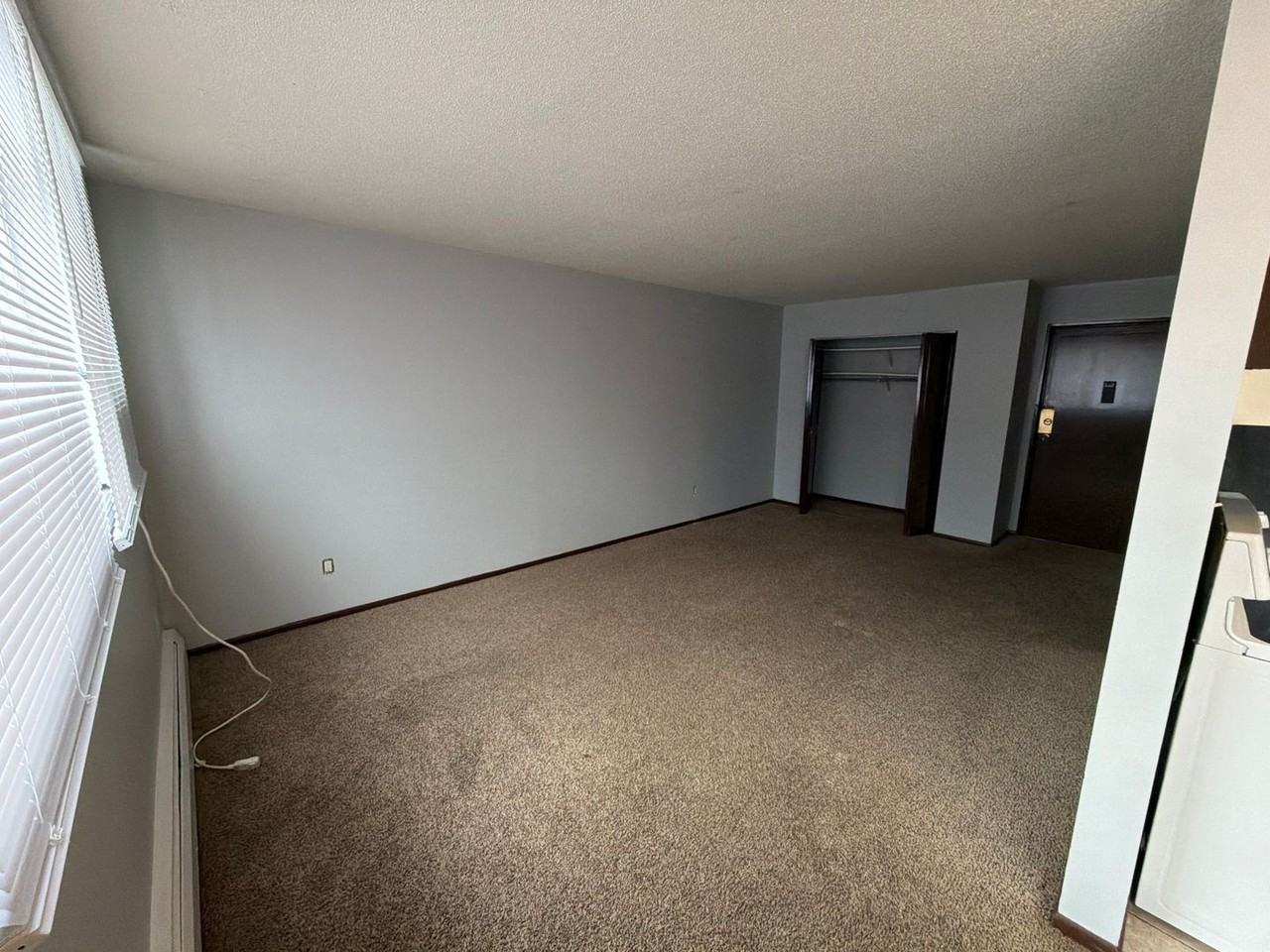Village Green Apartment - Photo 2 of 4