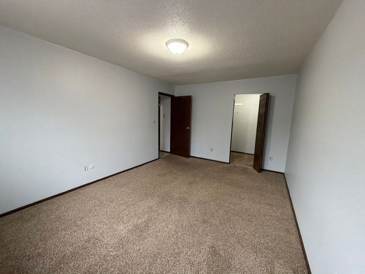 Village Green Apartment - Photo 3 of 4