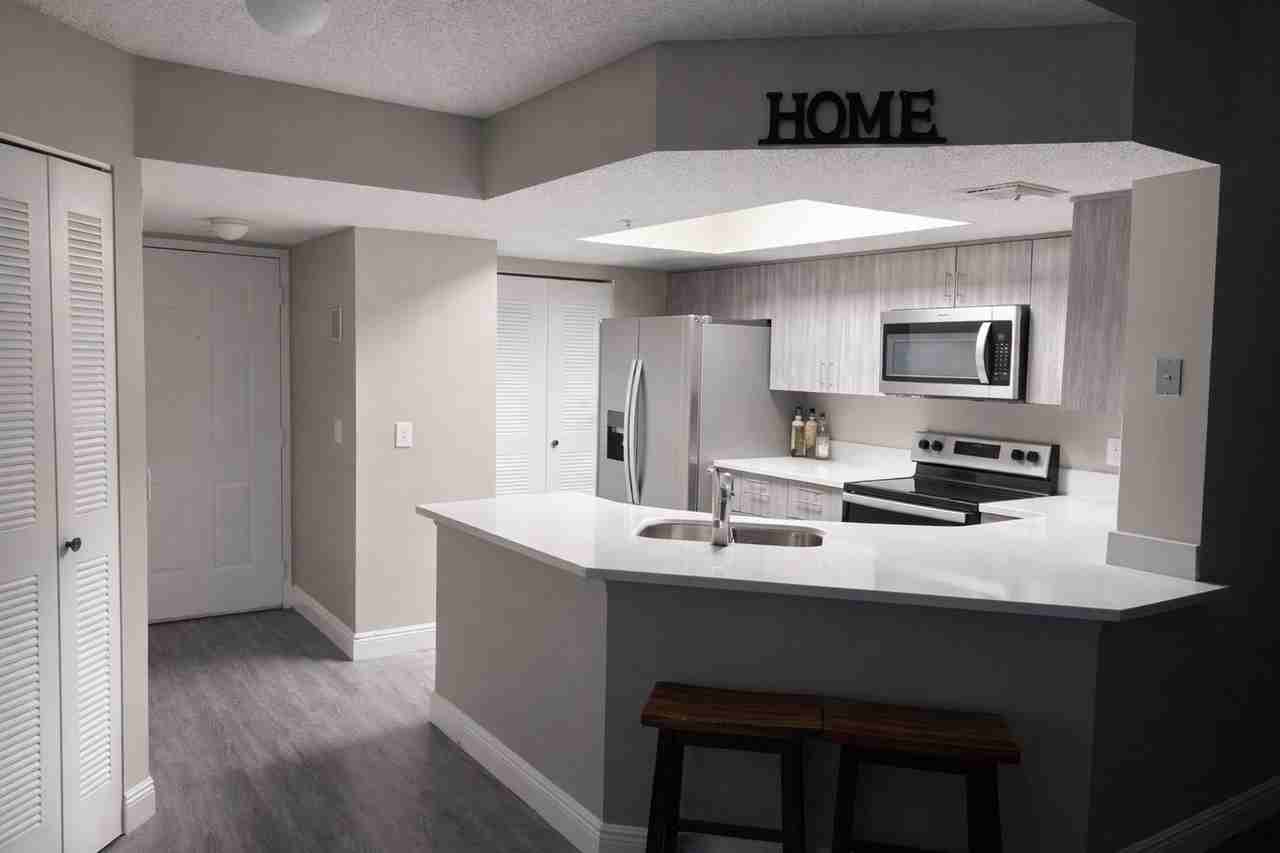 5065 Wiles Rd - Photo 2 of 10