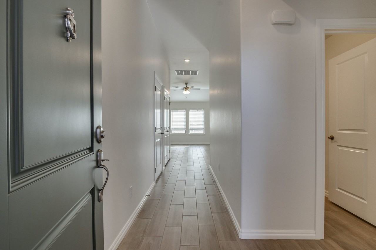 8716 Poppey Pl - Photo 3 of 31