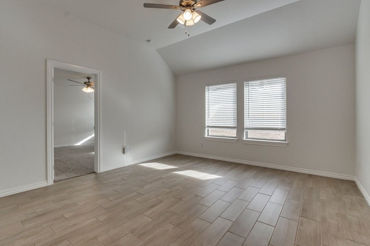 8716 Poppey Pl - Photo 7 of 31