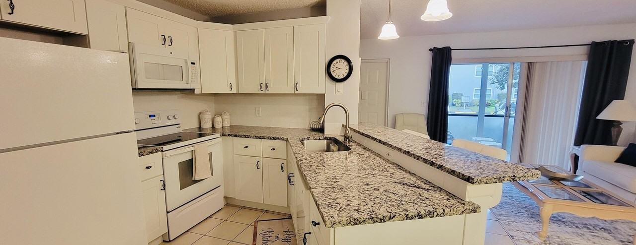 7527 S Oriole Blvd #103 - Photo 4 of 14