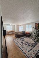 featured image of 8727 W 63rd Pl #8729