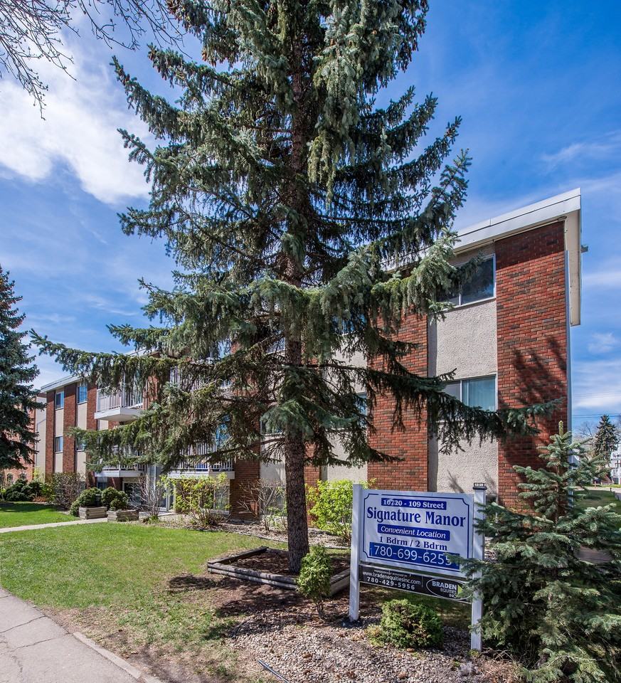 Signature Manor - Photo 2 of 20