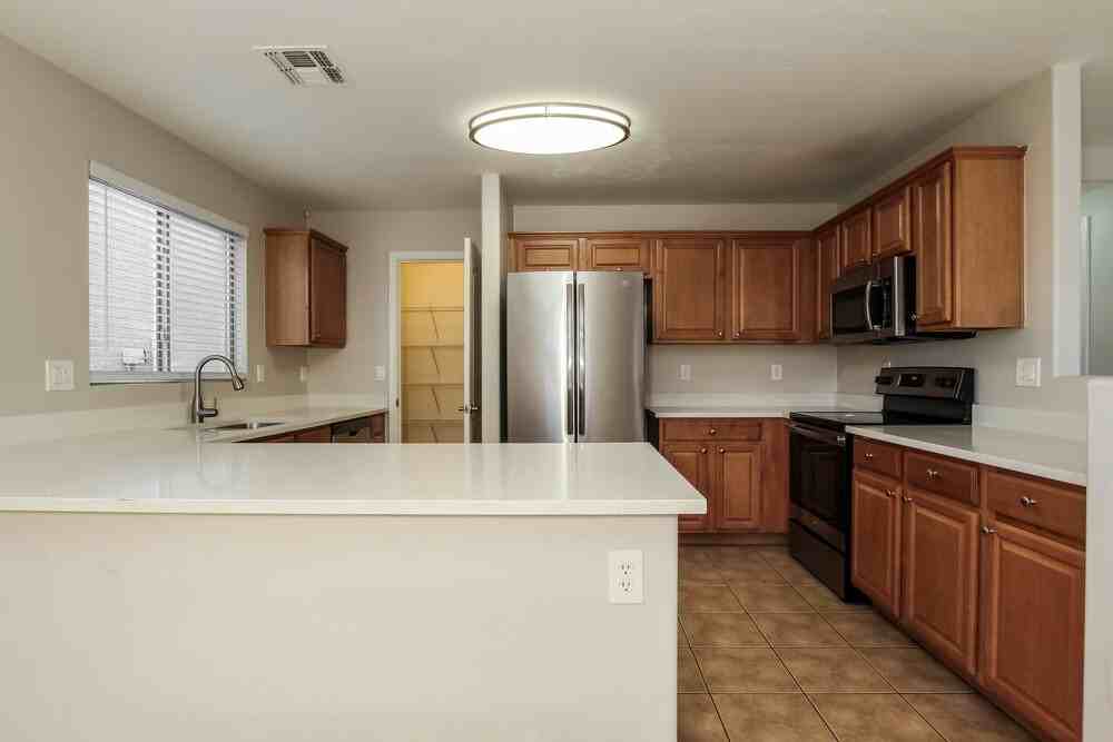 6728 N 130th Ave - Photo 5 of 17