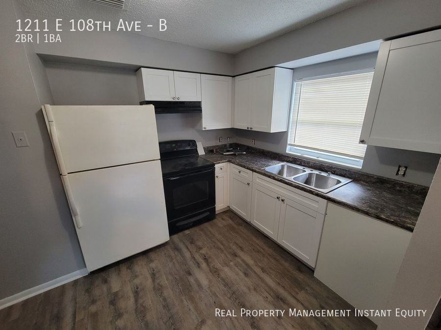 1211 E 108th Ave #B - Photo 3 of 10