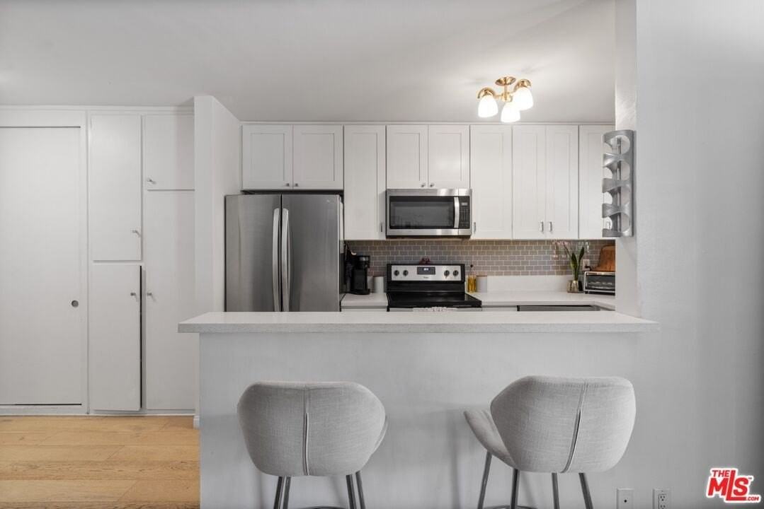 8630 Falmouth Ave Apt 4 - Photo 3 of 8