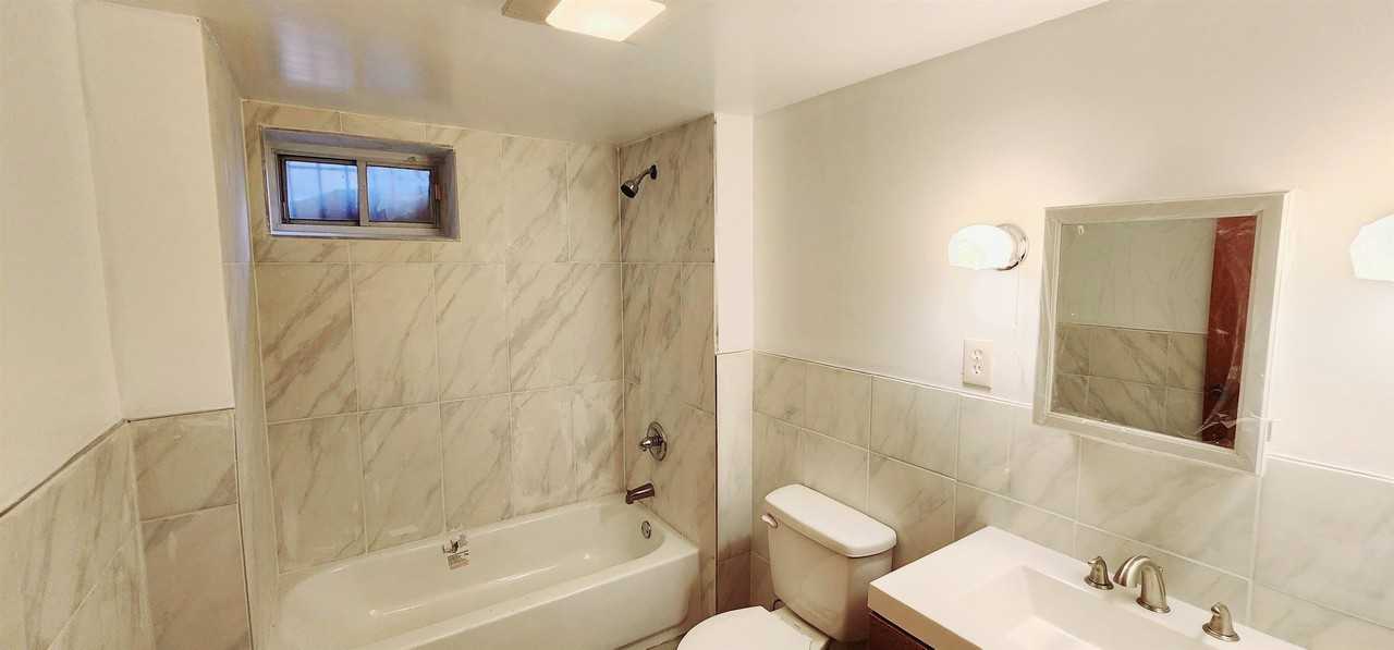 296 Paterson Plank Rd #1 - Photo 6 of 8