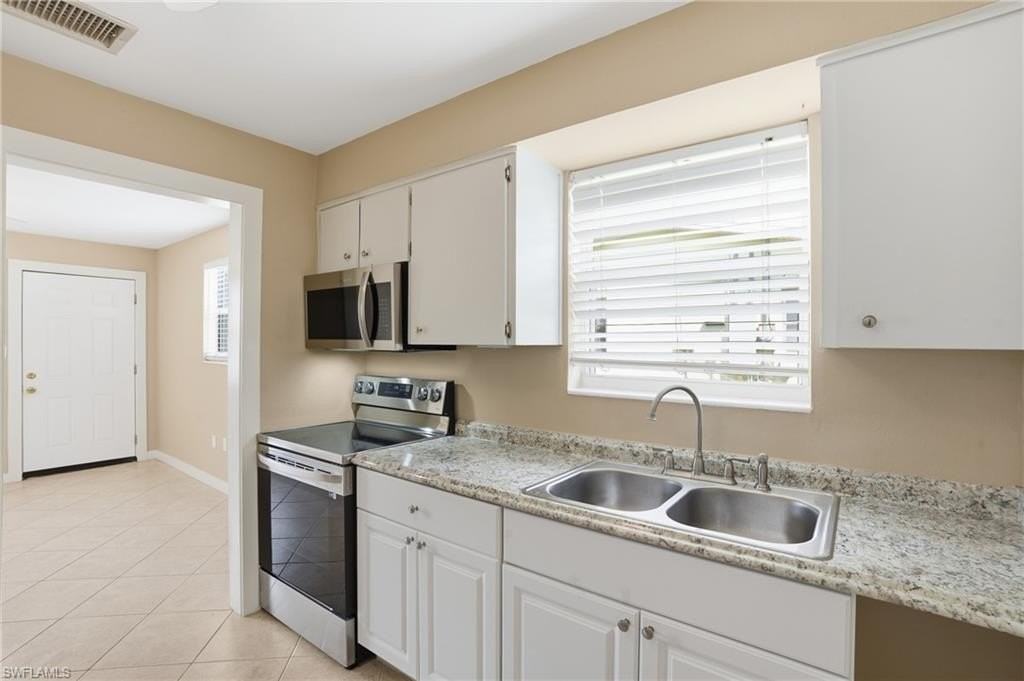 530 92nd Ave N - Photo 4 of 13