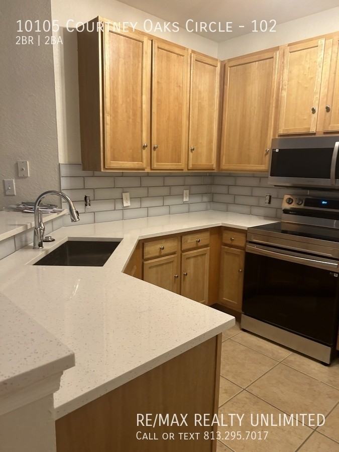 10105 Courtney Oaks Cir #102 - Photo 2 of 25