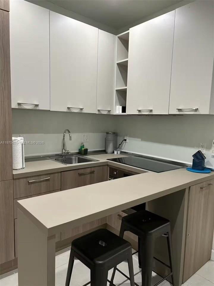 245 Ne 33rd St #207 - Photo 3 of 6