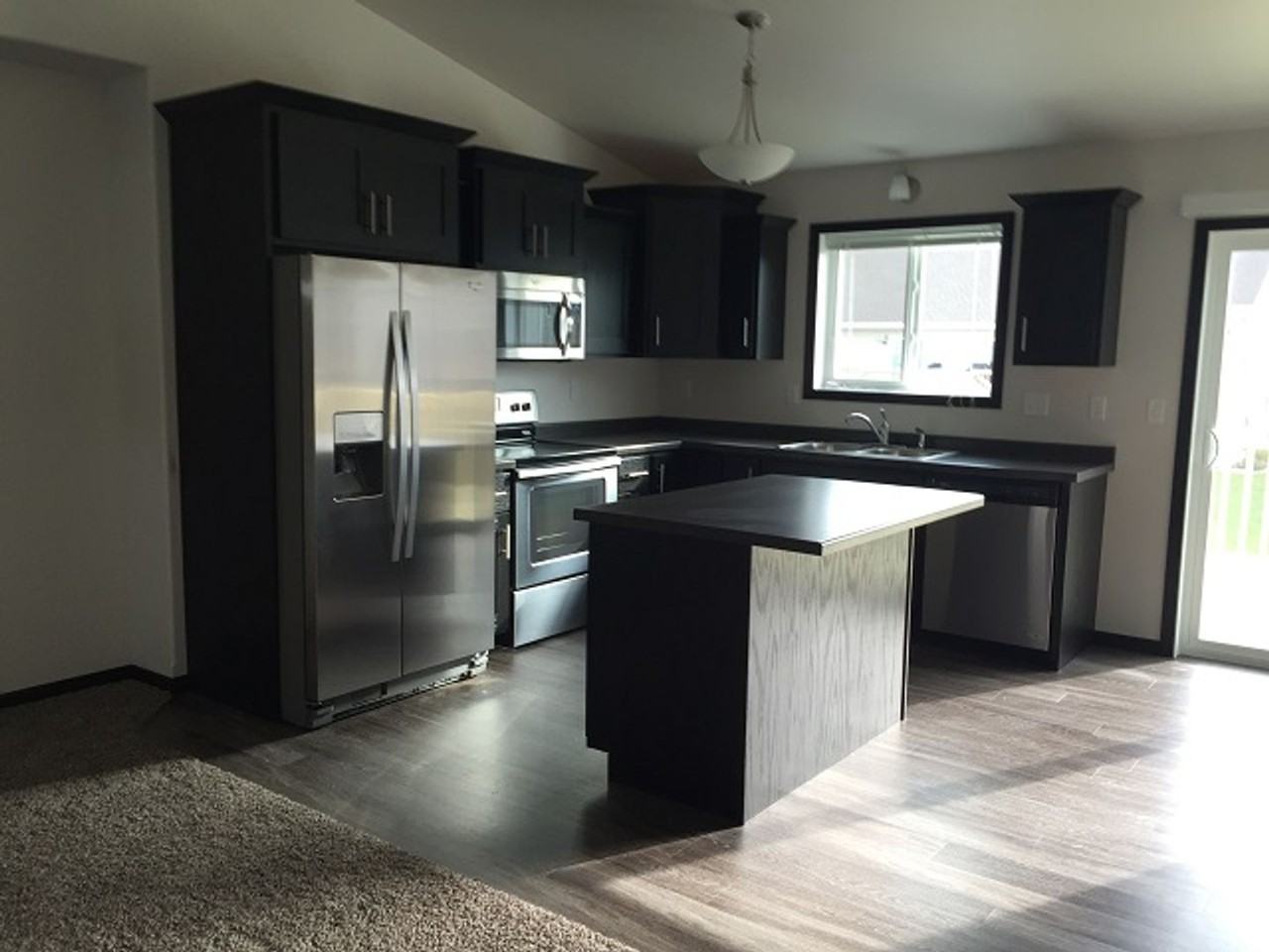 1019 29th Ave W - Photo 2 of 4