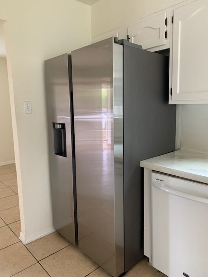 12302 Wycliff Ln - Photo 3 of 9