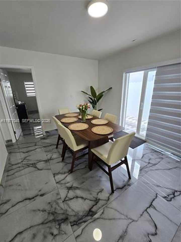 869 W 37th St - Photo 3 of 12
