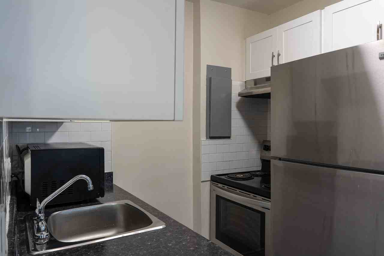 Embassy Tower Apartments - Photo 7 of 16