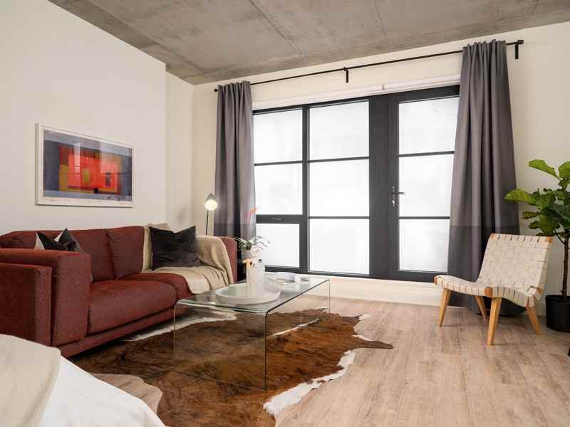 DOMO Condo Rentals - Photo 4 of 49