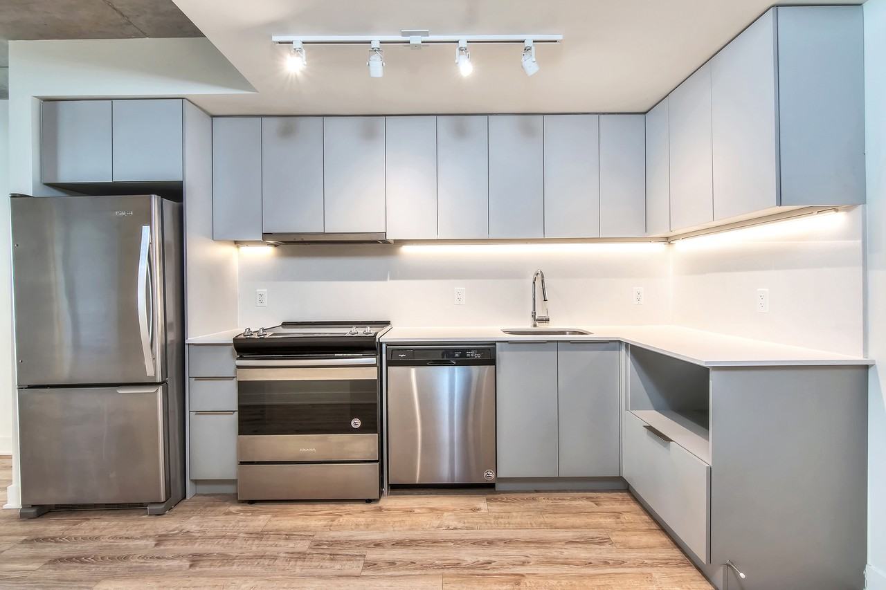 DOMO Condo Rentals - Photo 3 of 50