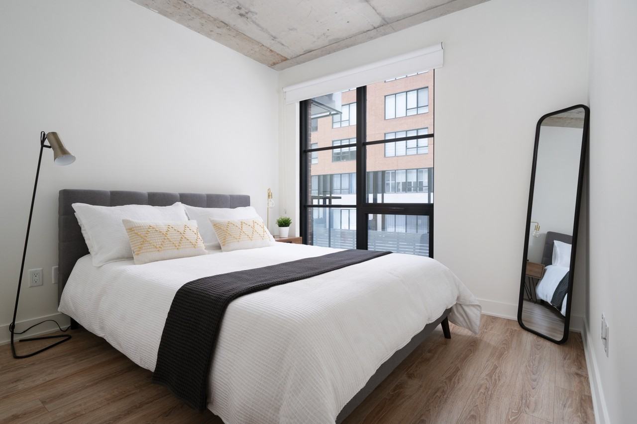 DOMO Condo Rentals - Photo 6 of 49