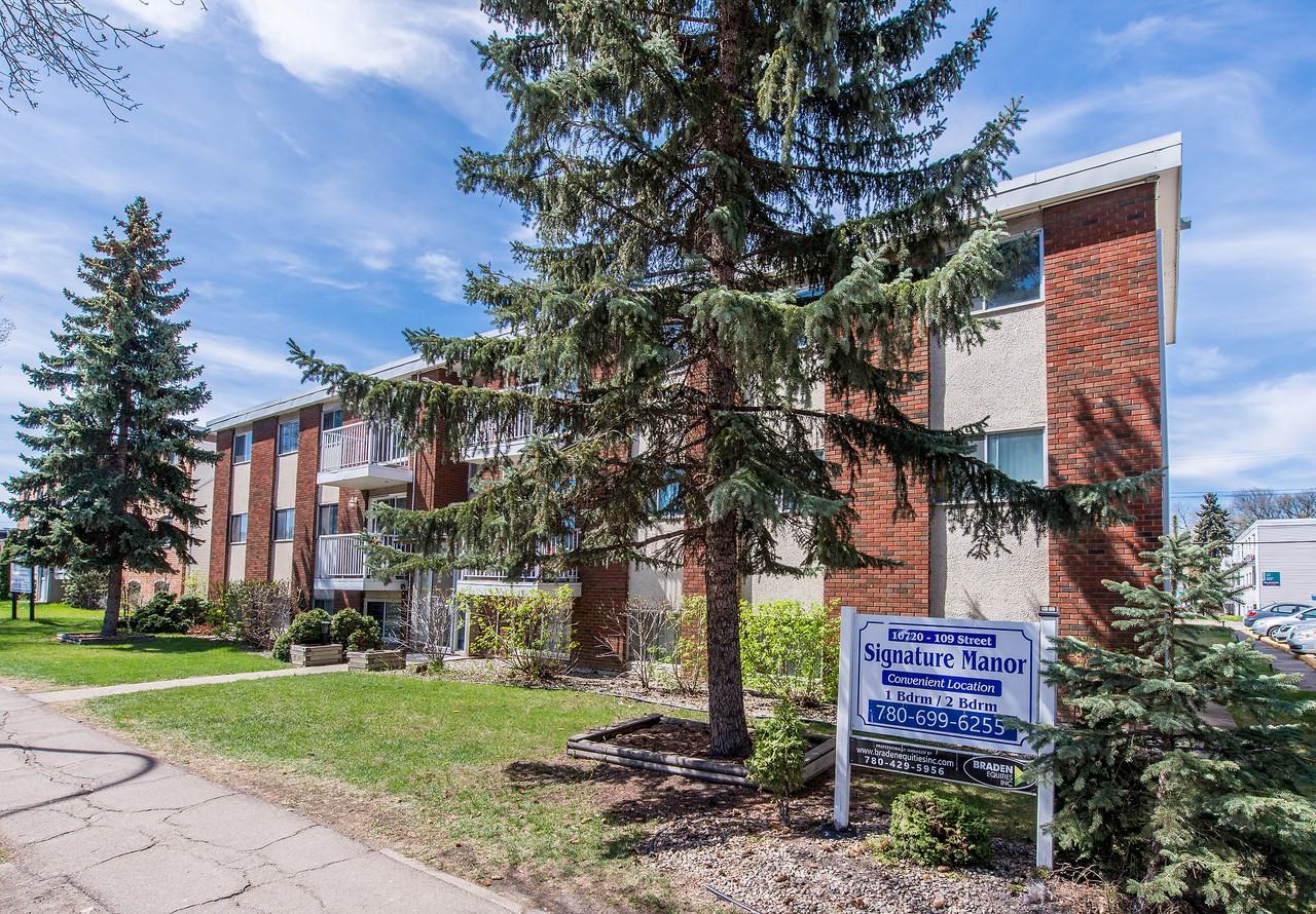 Signature Manor - Photo 3 of 20