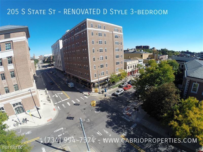 Corner House Apartments (205 S. State) - Photo 2 of 31