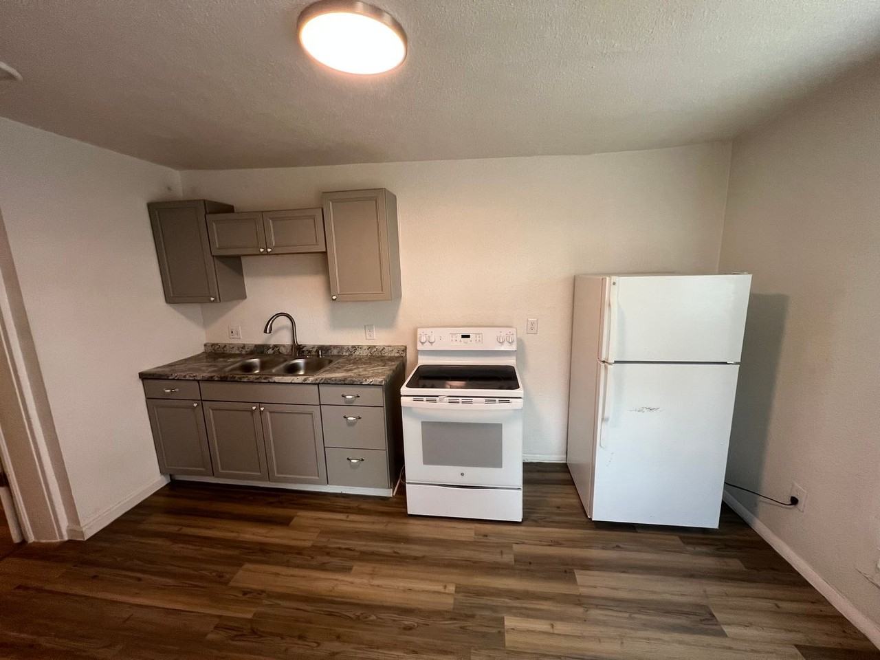 1427-1431 E Evans Ave. - Photo 2 of 21