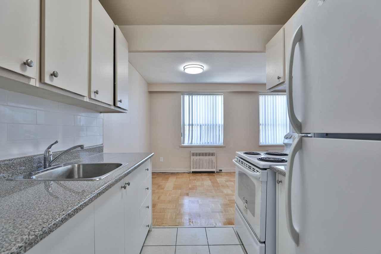 2223-2225 Eglinton Ave. E - Photo 2 of 24