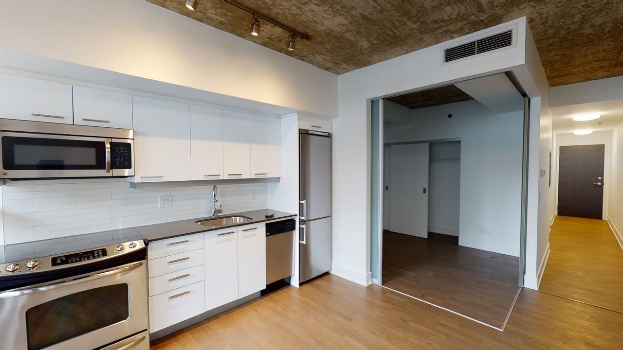 SYNC CONDOS - Photo 4 of 21