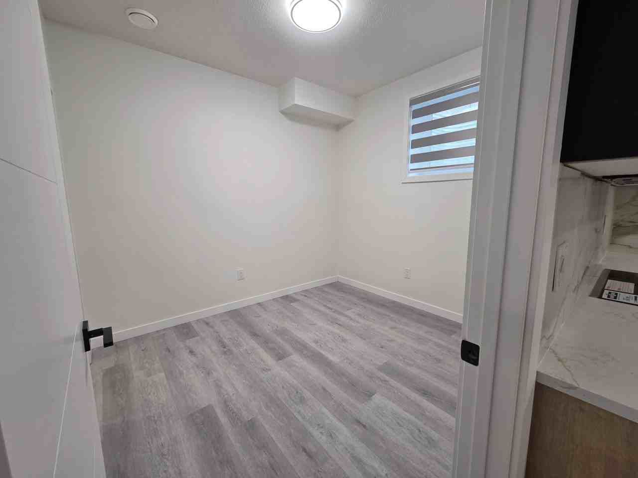 8015 83 St NW Basement Suite - Photo 2 of 8