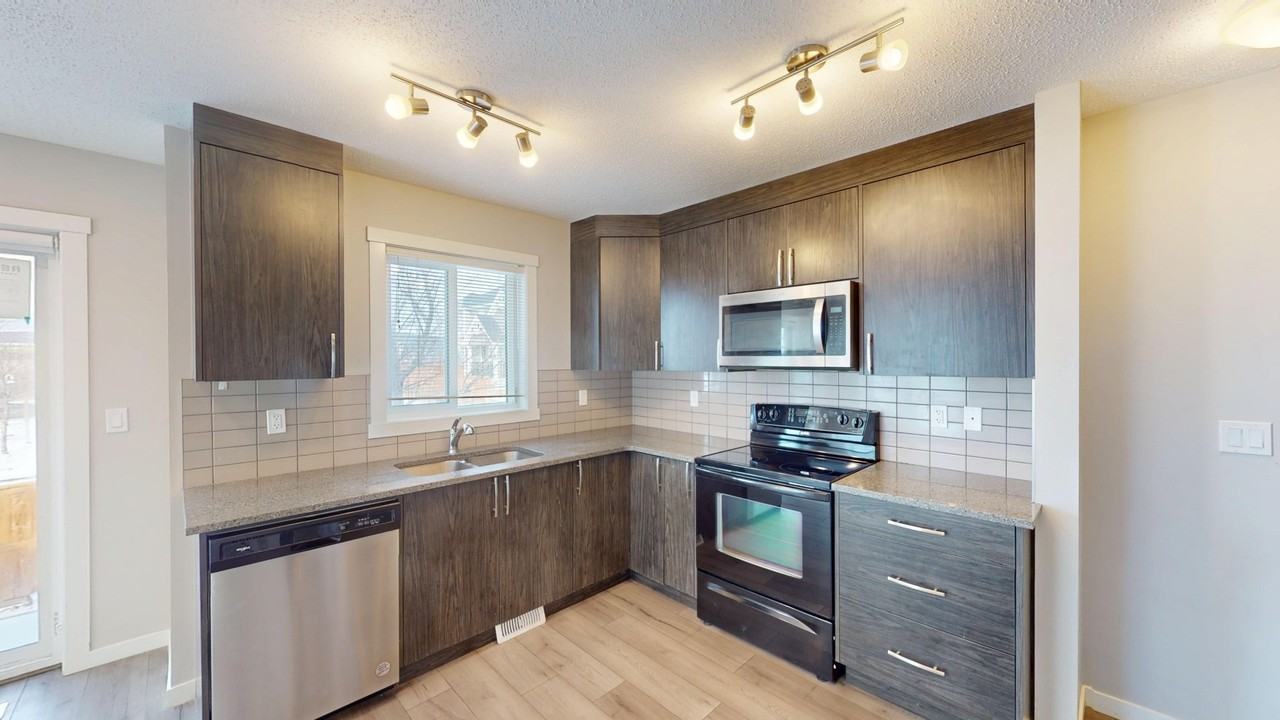 1004 - 7451 Falconridge Blvd NE - Photo 2 of 36