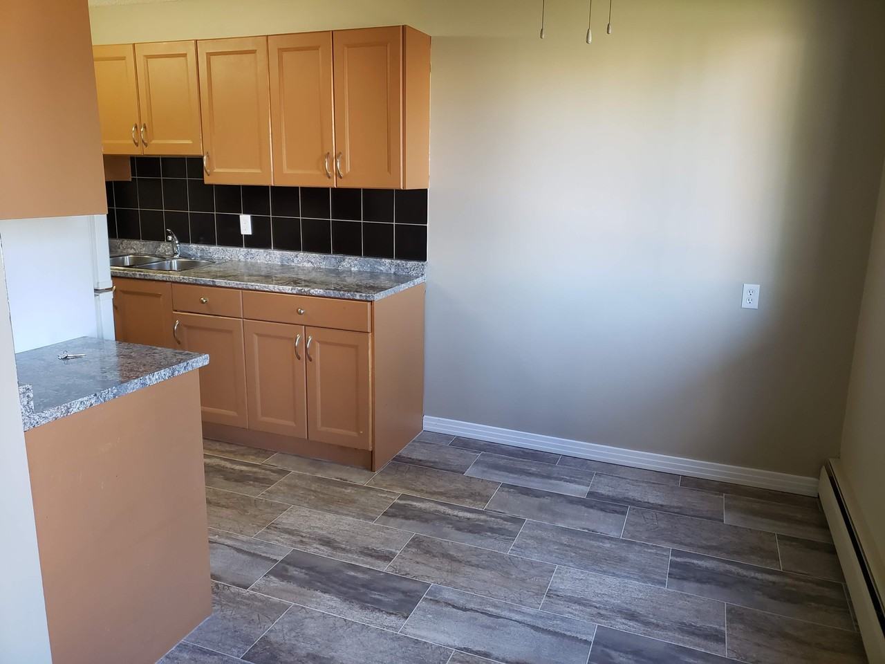 Duggan Manor - Photo 6 of 11