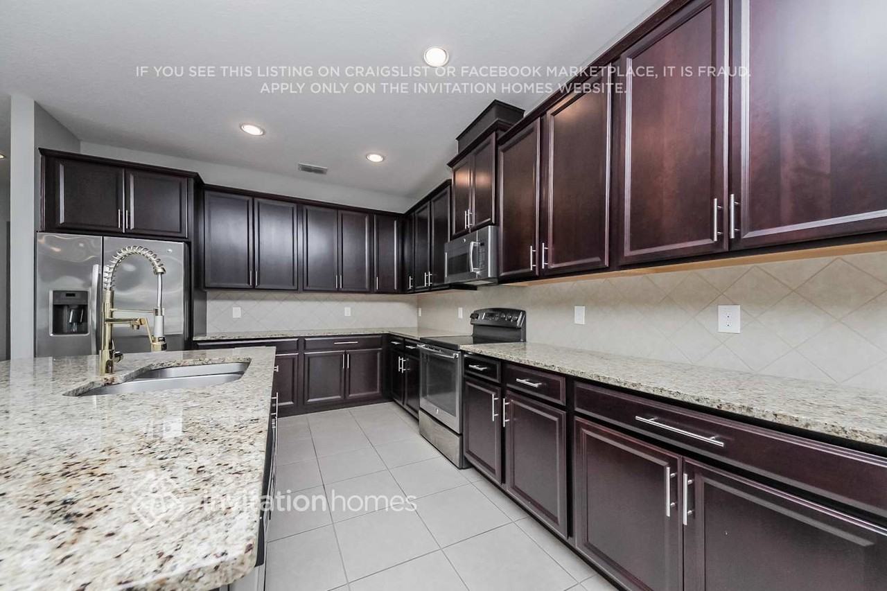 5159 Ravena Ave E - Photo 4 of 11