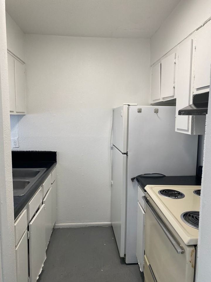 VICTOR APARTMENTS - Photo 2 of 12