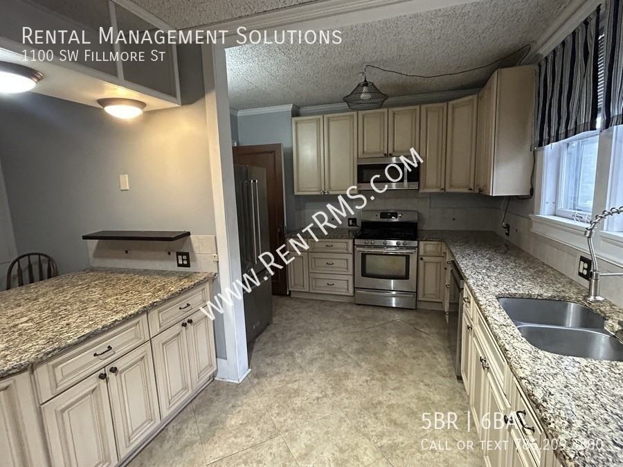 1100 Sw Fillmore St - Photo 7 of 35