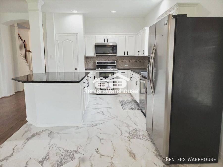 18819 Knobby Oaks Pl - Photo 4 of 26