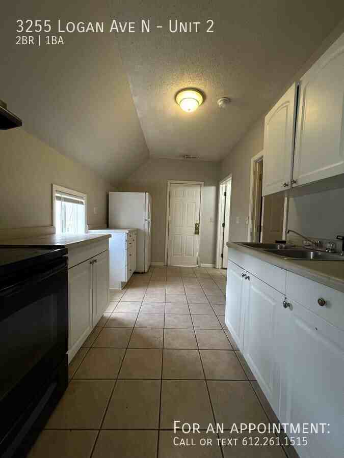 3255 Logan Ave N #2 - Photo 4 of 16