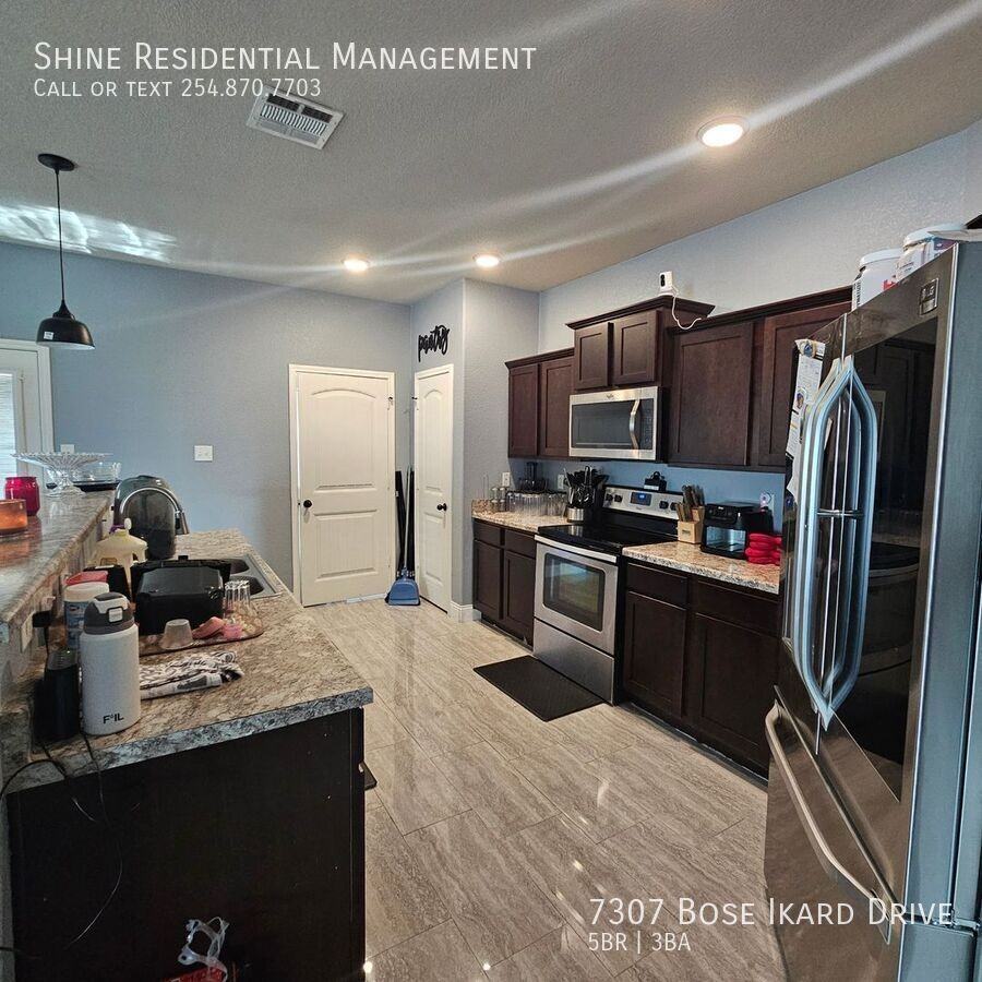 7307 Bose Ikard Dr - Photo 5 of 14