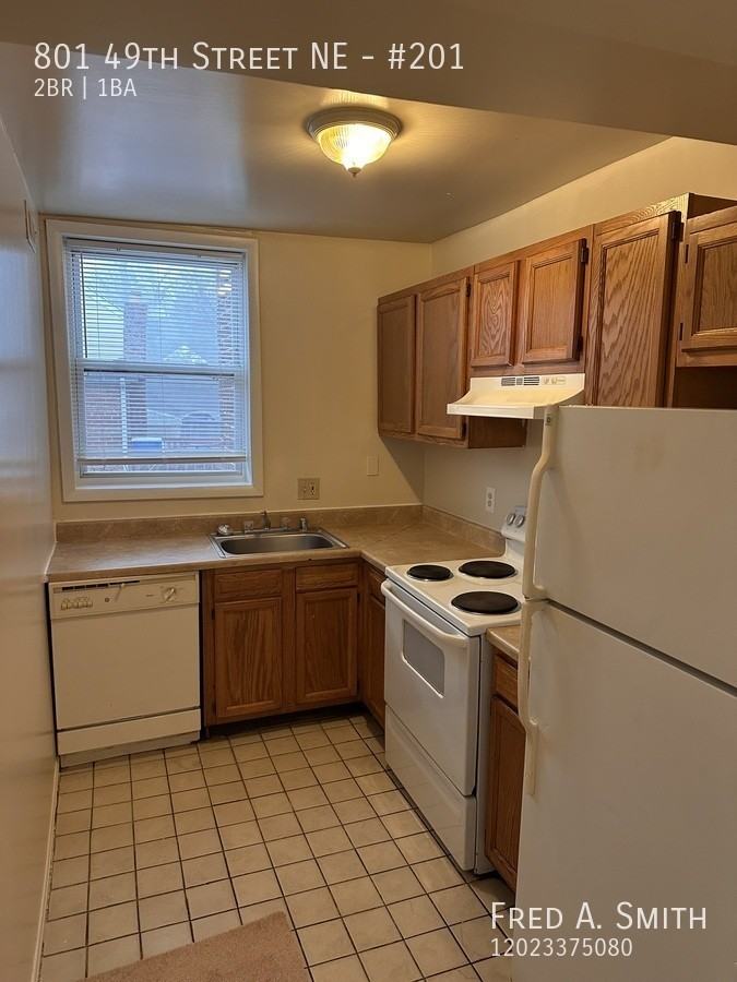 801 49th St Ne #201 - Photo 5 of 11