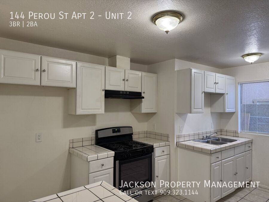 144 Perou St Apt 2 #2 - Photo 4 of 11