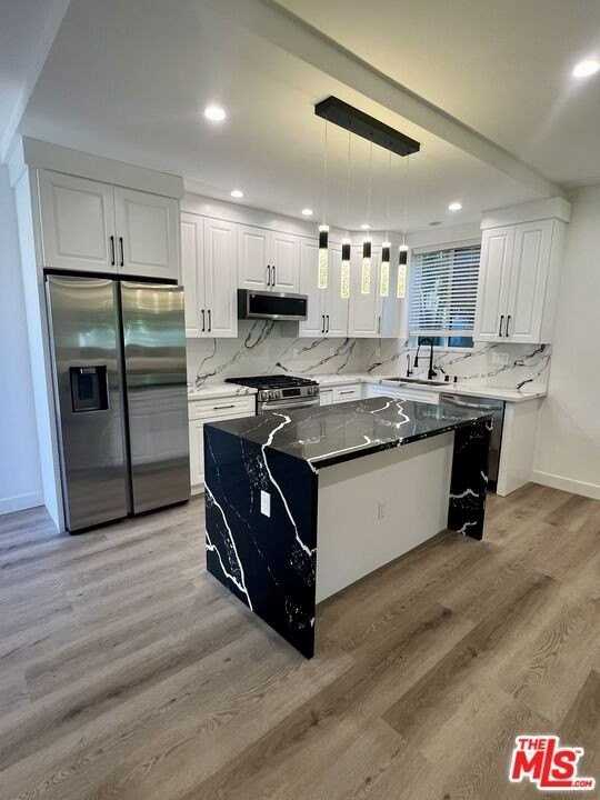 8854 Cashio St Unit Adu - Photo 2 of 12