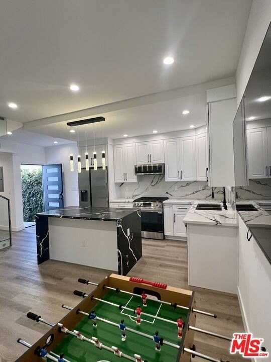 8854 Cashio St Unit Adu - Photo 3 of 12