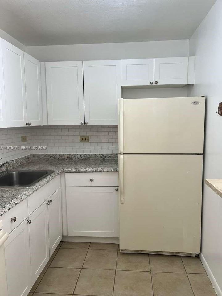 7020 Nw 179th St #109 - Photo 2 of 6