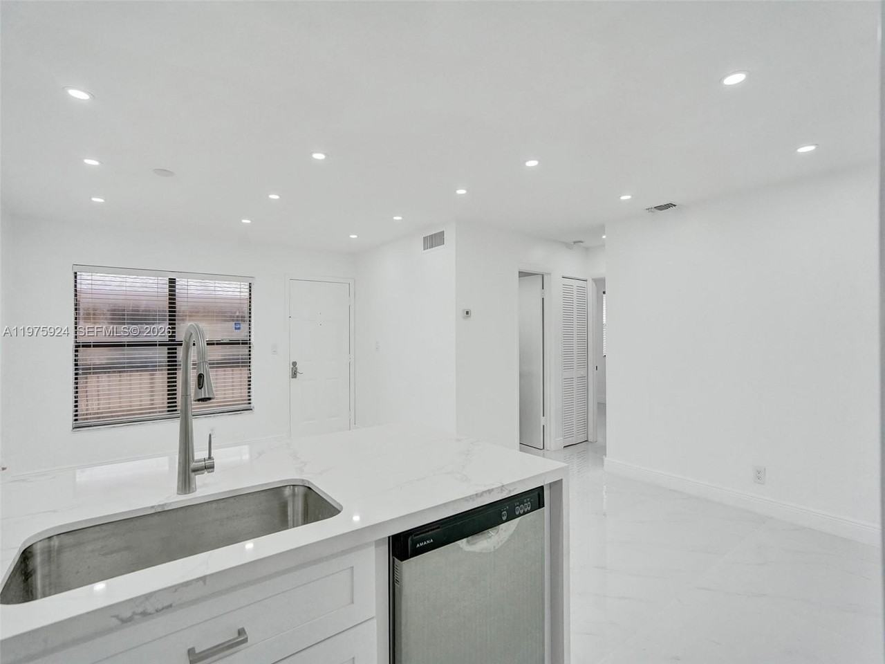 10051 Winding Lake Rd #201 - Photo 2 of 24