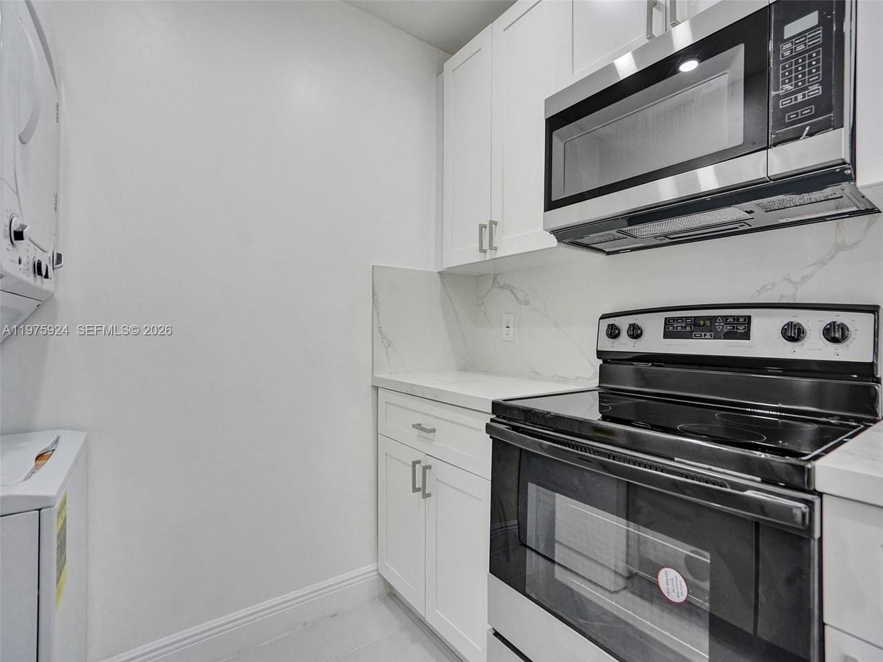 10051 Winding Lake Rd #201 - Photo 5 of 24