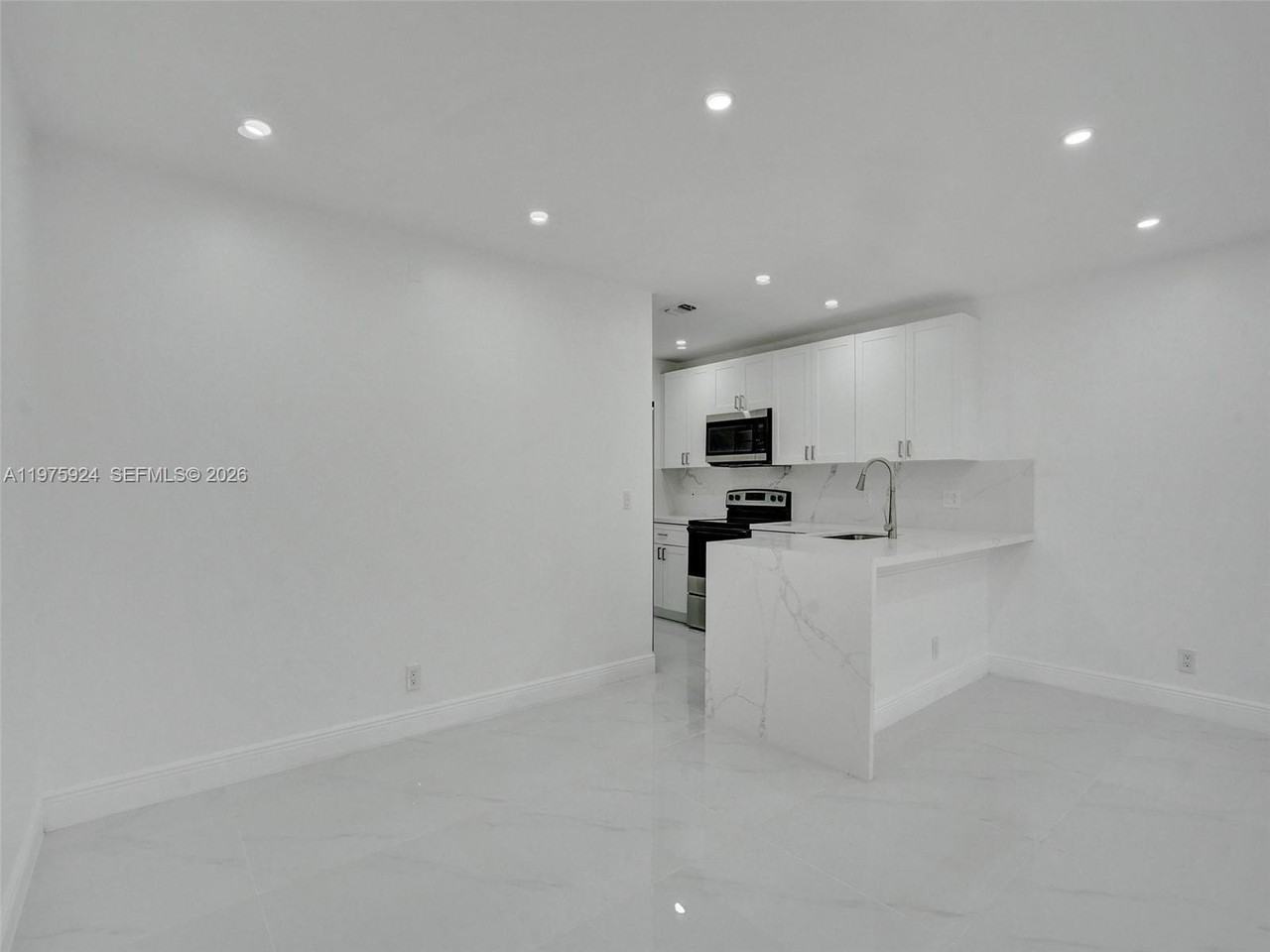 10051 Winding Lake Rd #201 - Photo 7 of 24