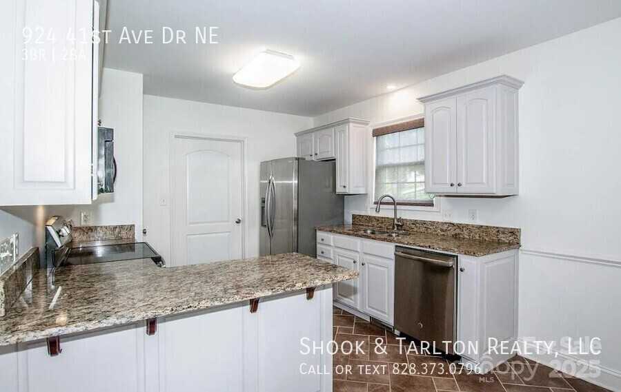 924 41st Avenue Dr Ne - Photo 5 of 9