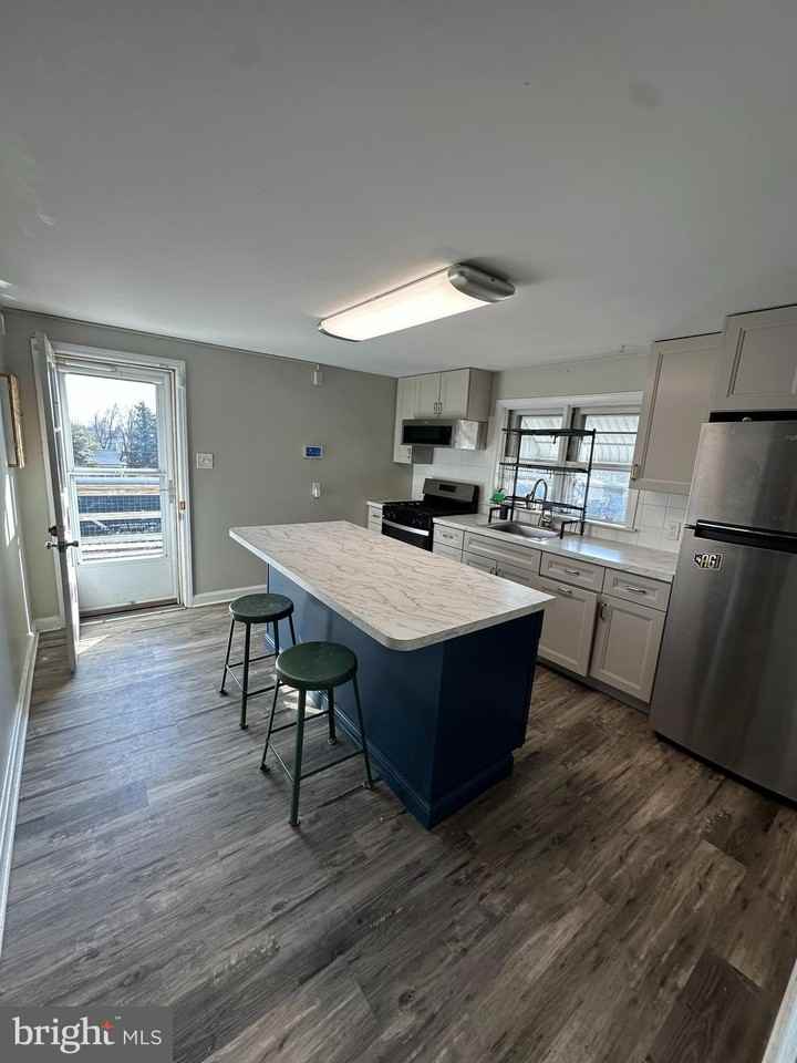 277 S 3rd St - Photo 2 of 7