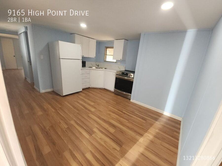 9165 Highpoint Dr - Photo 2 of 29
