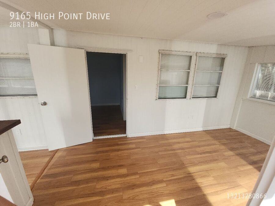 9165 Highpoint Dr - Photo 3 of 29
