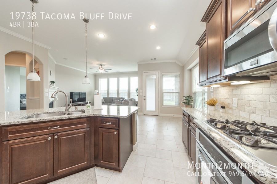 19738 Tacoma Bluff Dr - Photo 7 of 26