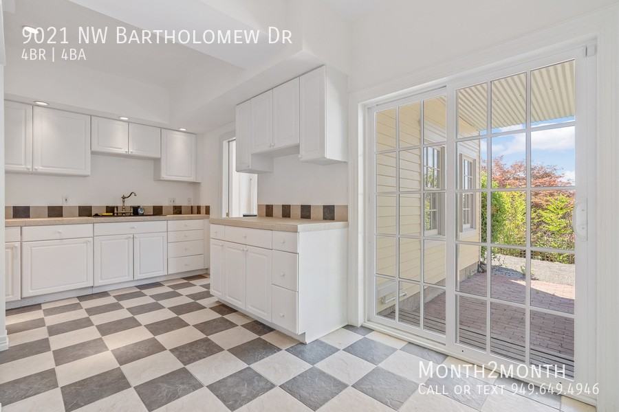 9021 Nw Bartholomew Dr - Photo 4 of 37